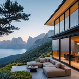 a large living room with a large couch next to a big window
