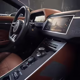 inside view of a vehicle showing info system and car stereos