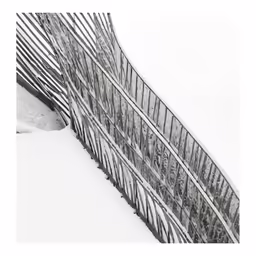 a large fence covered in snow with no one around
