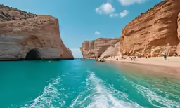 the boat is entering the entrance to the cave