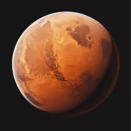 a red planet with brown spots on its surface
