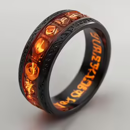 a black and orange ring with glowing yellow skulls on it