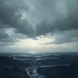 a lake in the distance under a cloudy sky