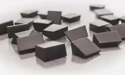 a collection of rectangular shapes made of grey marble