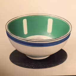 a bowl is sitting on top of a black stand