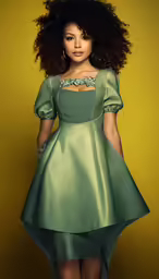 a black woman wearing a green dress