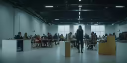 a very large room full of people in it