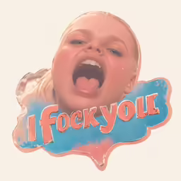 a small child has his tongue out to the camera