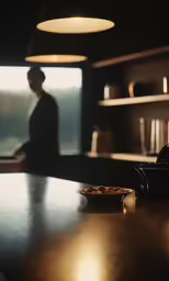 a close up of food on a table near a person in the background