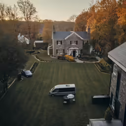 an old home is in the middle of the fall