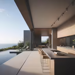 an empty outdoor kitchen in front of the sea