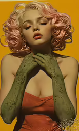 this is an image of a woman with green gloves on