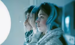 the two people are looking at their surroundings from the air