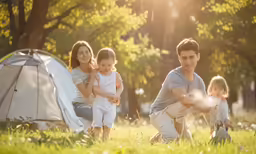 a family having fun in front of their tent