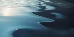 a very wavy, blue, deep ocean surface