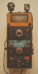 a vintage radio with several knobs and numbers