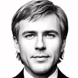 an image of the man in a suit and tie