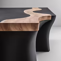 two wood and metal tables on top of each other