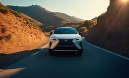 white nissan ur - v driving on road in mountainous region