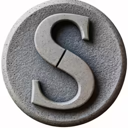 the grey stone letter s is in the shape of a rounded