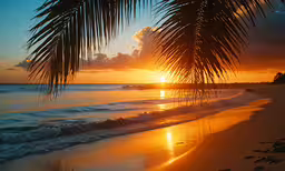 a sunset on the ocean and some small boats