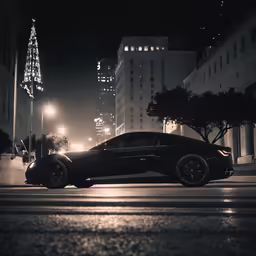 a black sports car sits parked on the side of a street