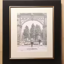 the man is walking in front of the gate