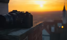 a camera sitting on top of a brick wall