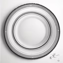 three plates and spoons are in the same line on the table