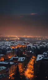 a city is covered in snow and is lit up