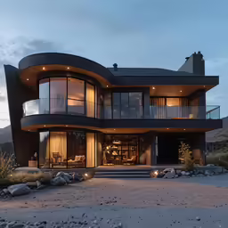 an artistic, curved house sits high up on the mountainside