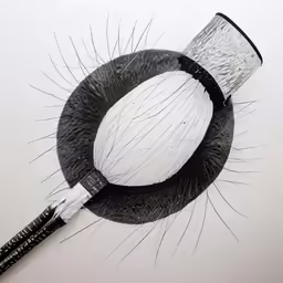a pencil drawing of a black and white wreath