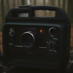 a closeup of an old radio in a wooded area
