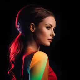 a woman is standing in a pose and the hair is done in low ponytails