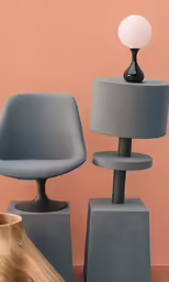 a photo of an object in the shape of a chair and lamp