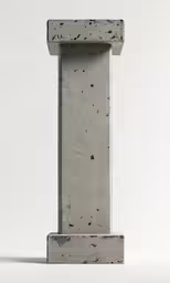 a cement obelisk sitting in the middle of a white floor