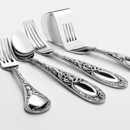 silverware with decorative designs, forks and knifes