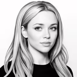 a woman with blonde hair looking directly into the camera