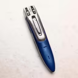 an electric tooth brush with the blade pointed upwards