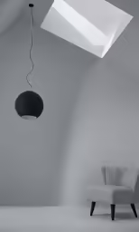 a chair and an empty light fixture inside a room