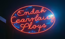 a neon sign that reads, endahcartory play