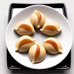 a plate filled with little desserts on top of a table