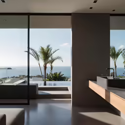 a modern bath tub with large windows facing the ocean