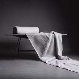 a table with two large towels on it