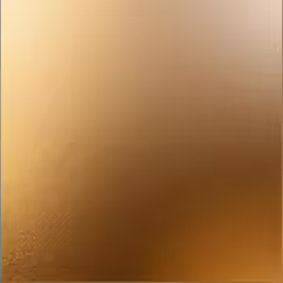 an abstract gold colored metal plate with highlights