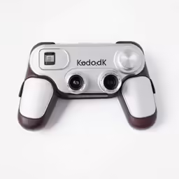 a game controller on a white surface