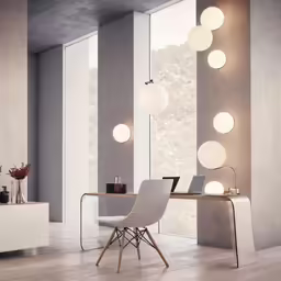 an office with many lighting fixtures on it