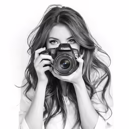 a woman is taking a photograph with her camera