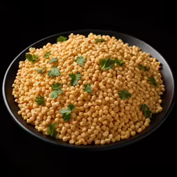 a bunch of yellow corn is in a bowl