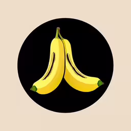 two bananas with green tips on a black circular object
